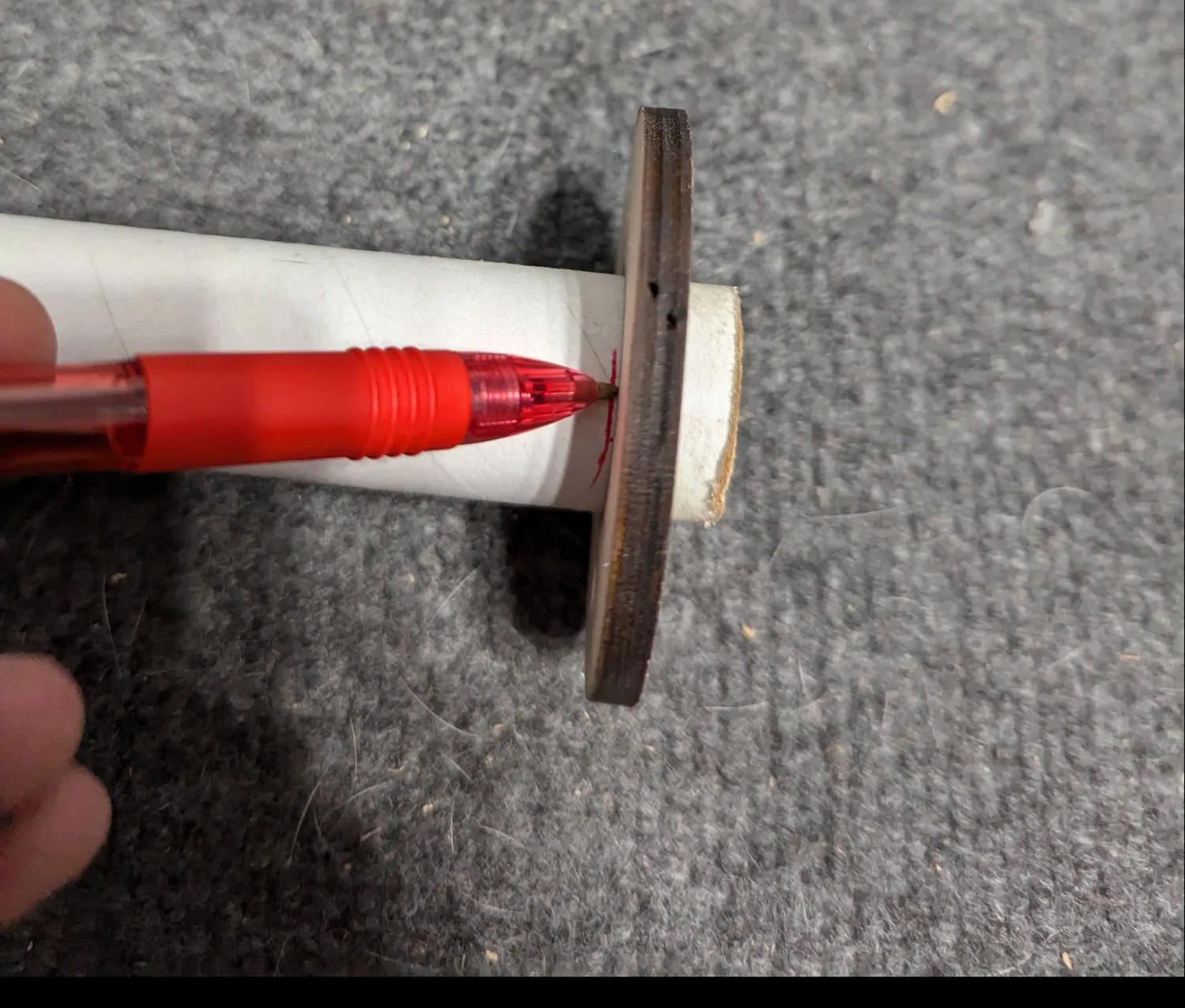 Marking around the tube at the edge of the forward ring.