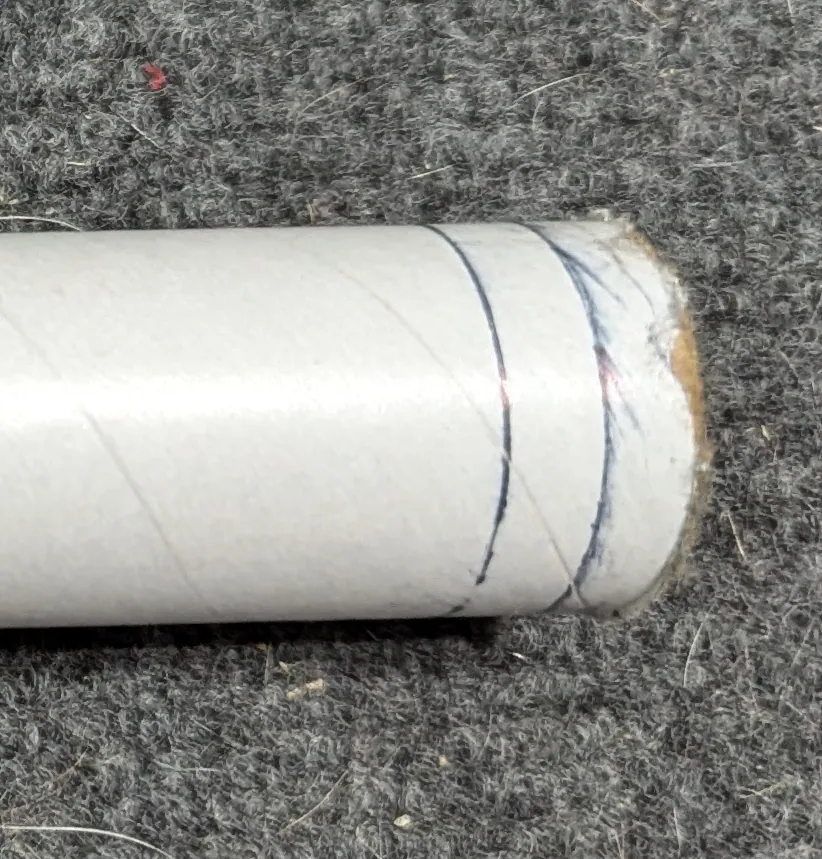 Both reference lines marked on the tube.