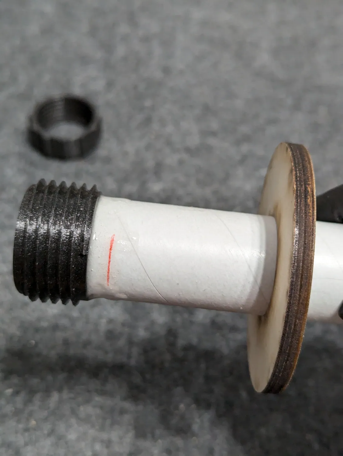 Retainer and aft ring slid into place against each other.