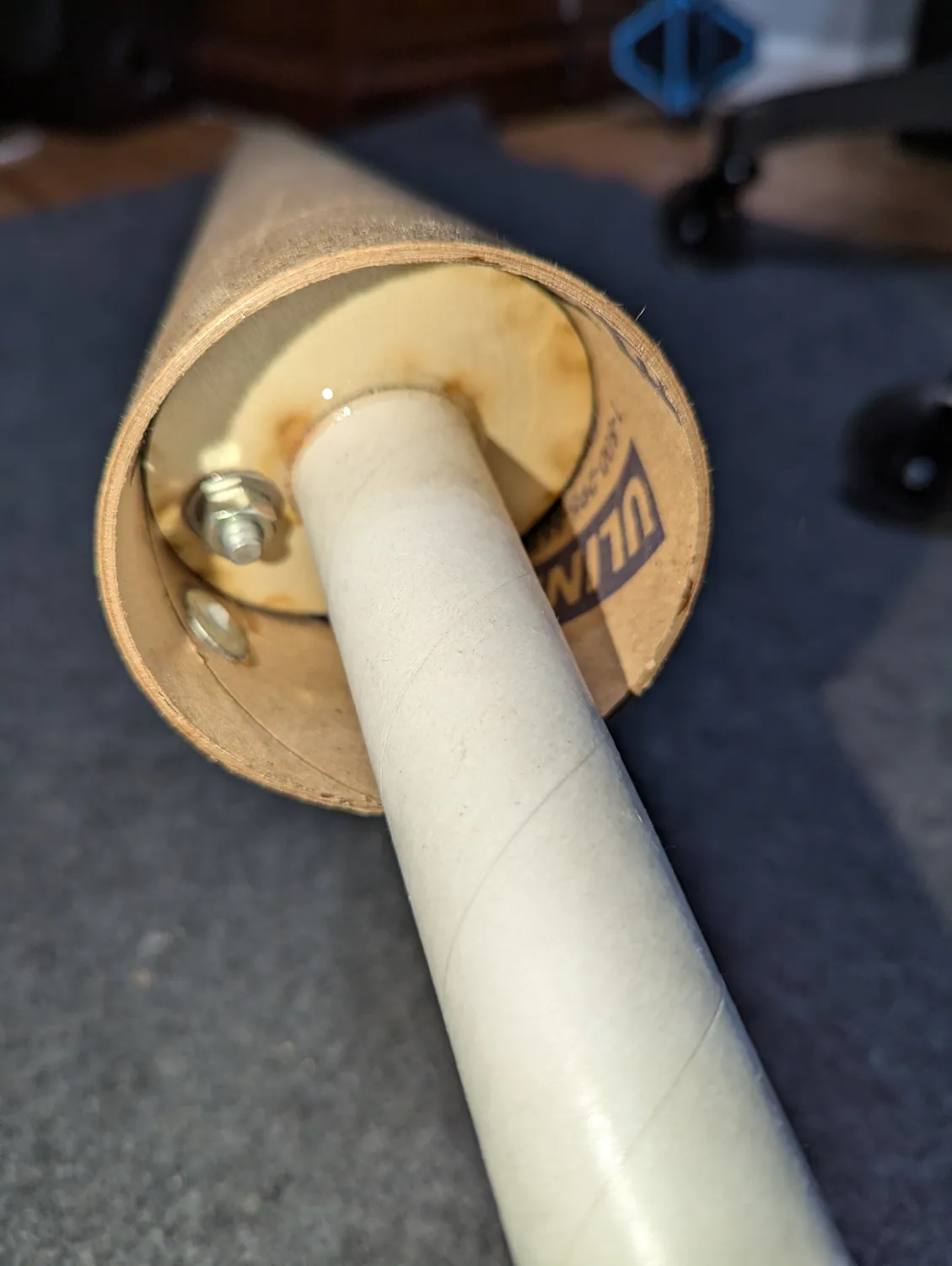 Enter at an angle to clear the rail button hardware.