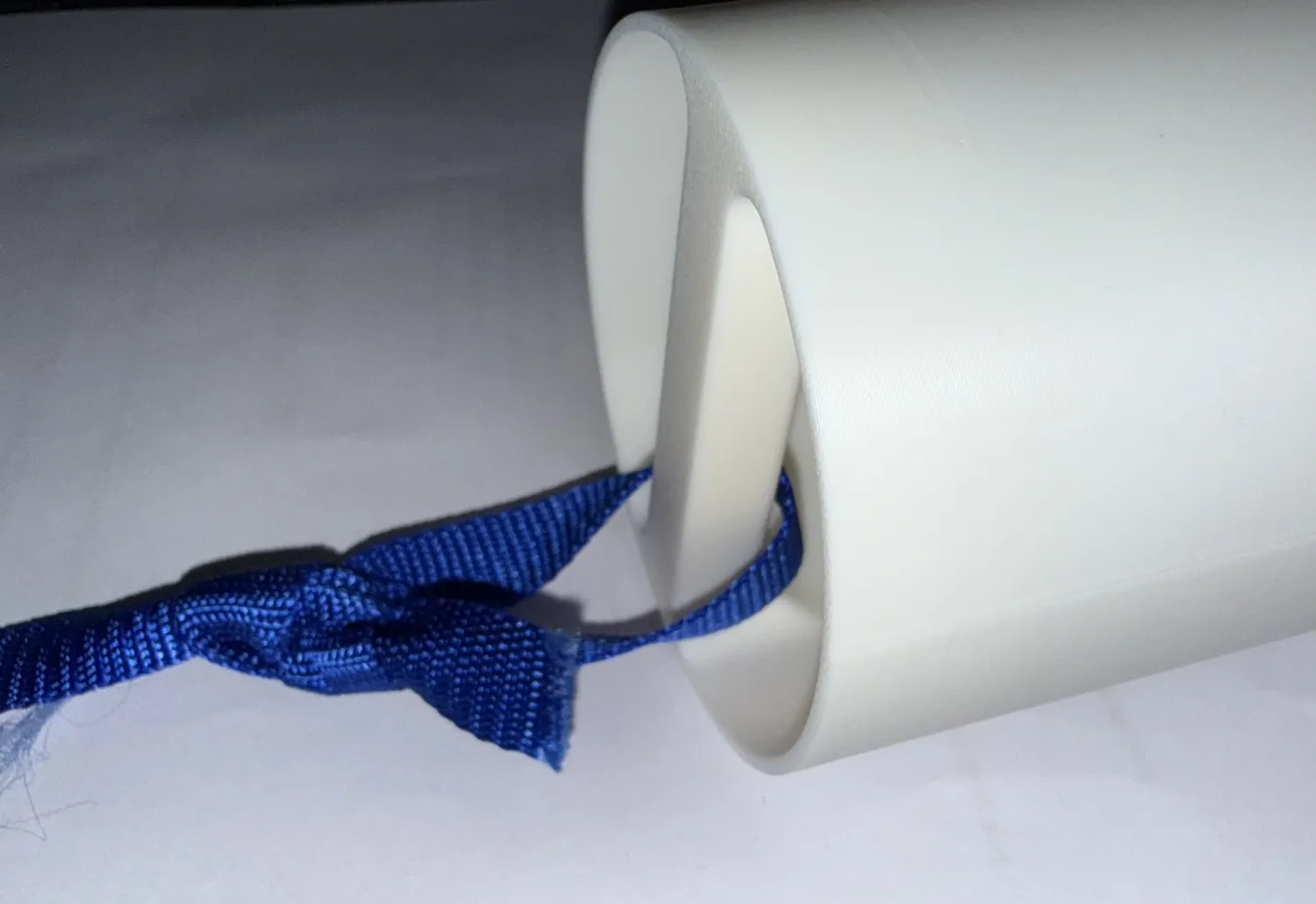 Nylon tied around the nose cone bar.